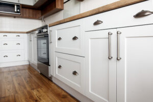 Read more about the article How To Clean Painted Kitchen Cabinets:  Just Add Paint